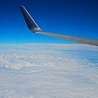 JAL261便　機上～　空-雲-地表の光景　☆三河湾-関西空港-大阪湾-淡路島？辺りを通過し