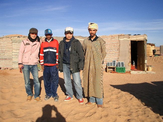 少年と・・・、右の人は？？