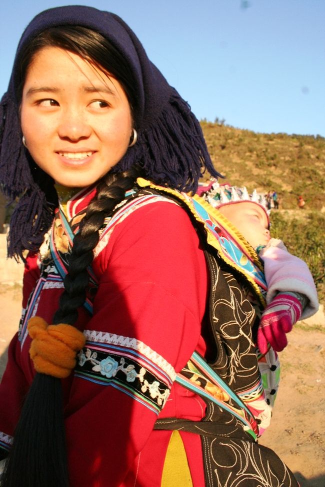 同じくハニ族と思われる女性。<br />綺麗ー☆