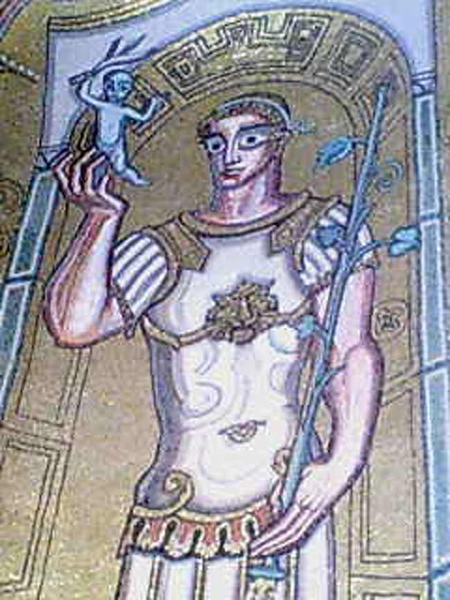 市庁舎にて（その4）黄金の間にある、タイルでつくられた人物像。かなりオモロイ顔してました。<br />しかも手に小人のせてて、さらに拍車。