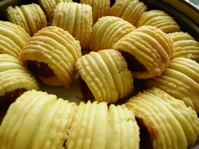 このパイナップルロールは、<br />崩れやすいということだったので、<br />日本に持ち帰らず、旅行期間中にホテルで<br />食べきることにした。<br /><br />クッキーミックスと比べて、私はこの<br />パイナップルロールの方が好みだなぁ。<br /><br />あっさりさっくり、<br />パイナップルジャムの甘酸っぱさも美味しくて、<br />あっという間になくなった。<br /><br />日本にはない食感。