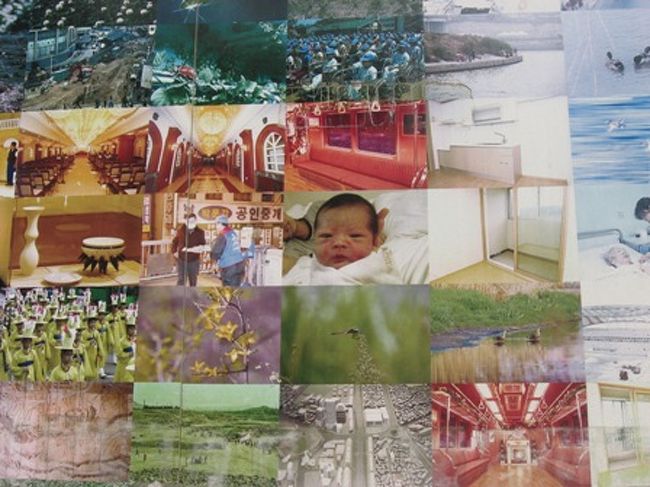 このモザイク画の壁、近づいて見ると無数の写真が集まって出来てる〜。<br />素敵ｖｖ