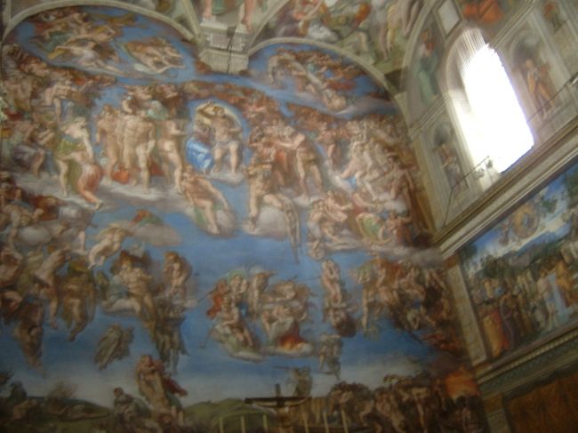 システィーナ礼拝堂の最後の審判（ミケランジェロ作）。<br /><br />教皇を選出するコンクラーヴェの会場としても使用されている。