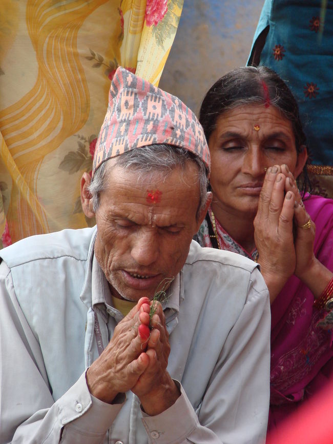 息子の成人を感謝する親。