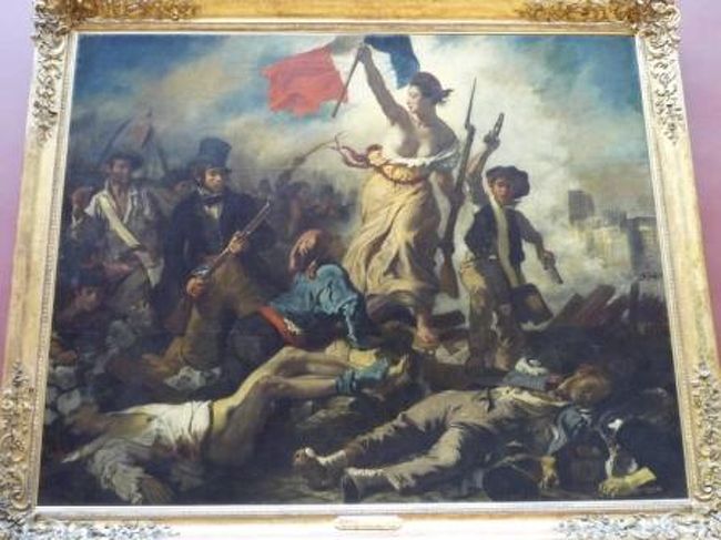 民衆を導く自由の女神。<br /><br />１８３０年、ドラクロワ作。<br />７月革命の年に描かれたもの。<br />自由の女神の隣にいる銃を持った青年は、作者自身との説も。