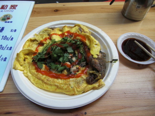 コロンス島名物の牡蠣の玉子炒め。<br />屋台で食べて火の通りが甘かったですが、<br />日本でも流行るぐらいおいしいです。