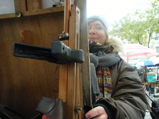 この方に描いてもらいました。<br />描いていただいている最中の写真です。