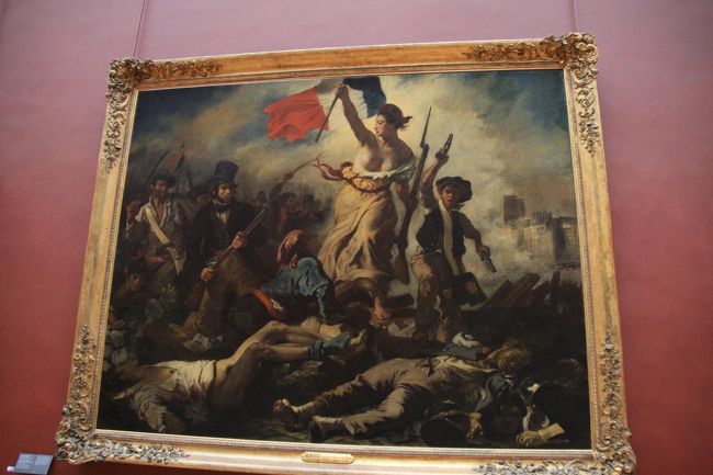 ルーブルの有名作のひとつ『1830年7月28日―民衆を導く自由の女神』<br />ドラクロワの作品です。<br />