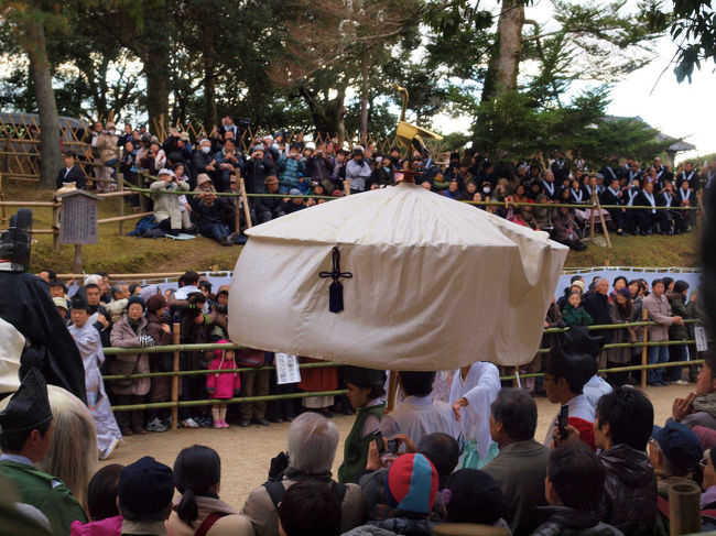 傘に鶴が留まる