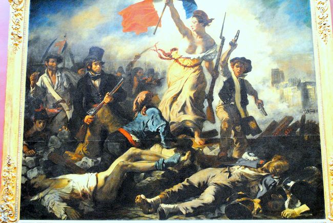 ウジェーヌ・ドラクロア「民衆を導く自由の女神」。<br />　1830年に起きた7月フランス革命を主題としたもの。女性の隣に立つマスケット銃を手にしたシルクハットの男性はドラクロア自身であると説明される事が多い。