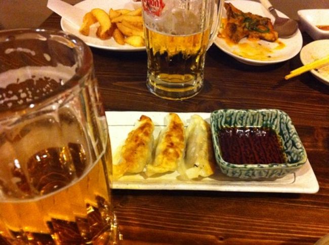 アグー豚の餃子は絶品でした。<br />あとウニの磯焼きもおいしかったなー。<br /><br />もちろんオリオンビールで今日も締めくくり。