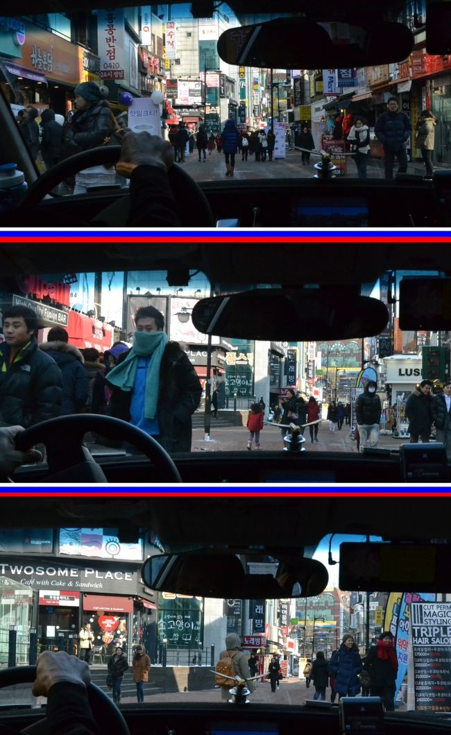 タクシーの中から撮影。<br /><br />道の真ん中を歩いている人がいっぱい。<br /><br />タクシーもクラクションをプープー。