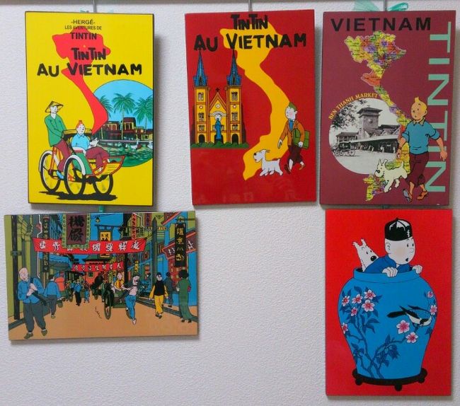 タンタンのピクチャーボード。<br />前回1枚だけ購入して、やっぱりもっと欲しくて今回<br />5枚買いました。<br /><br />全部で2キロ近くの重さがありましたが・・・<br /><br />ファングーラオ通りにあるメコン・ショップは1枚350円なのに、<br />ドンコイ通りで買うと700円や1000円近くしました。<br /><br />やっぱりドンコイ通りはちょっと高めの値段設定かも・・・<br /><br />右上のが1000円近くしたけど、一番のお気に入りです。