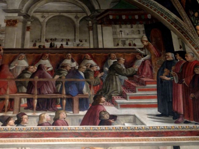 メディチ銀行の支配人だけあって、一番上に描かれている聖フランチェスコが教皇からフランチェスコ会の認可を受けるシーンは場所をローマからフィレンツェに変え、メディチ一族が総出演しています。