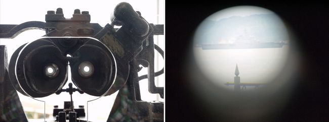 双眼鏡。それに、レンズにカメラを近づけてみました。<br />