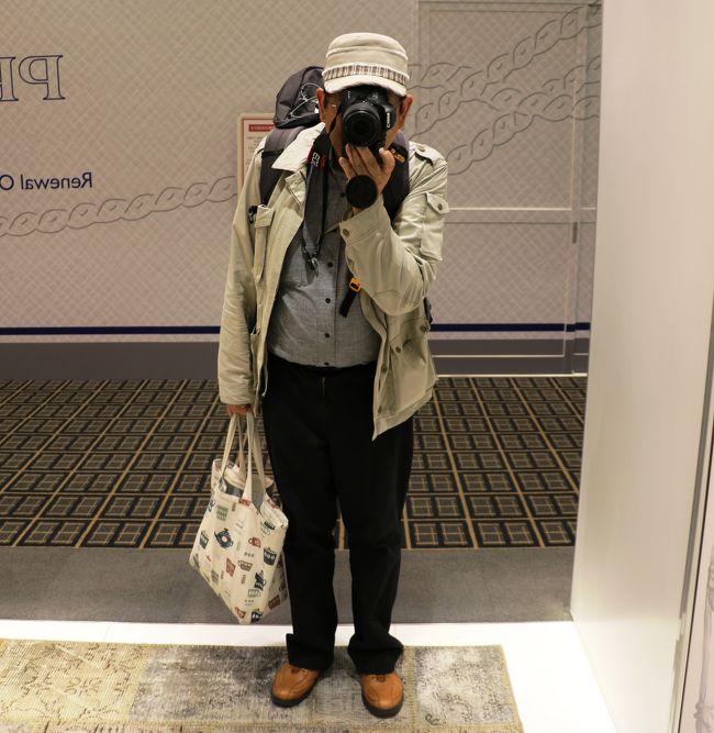 カメラを持った怪しいオジサン