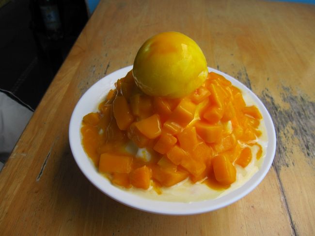 180元で高雄のより値段は高かったけど、こっちもウマー!!!で、食べて良かった。もう、マンゴーかき氷（雪花氷）はまりました…。自宅で雪花氷が作れるかき氷器まで買っちゃいました…。美味しいマンゴーは手に入りませんが。<br /><br />溶けちゃっているのは、番号呼ばれてもわからなかったからです（汗）<br />日本人のお客さん連れたタクシーの運ちゃんが言いに来てくれてわかりました。<br /><br />