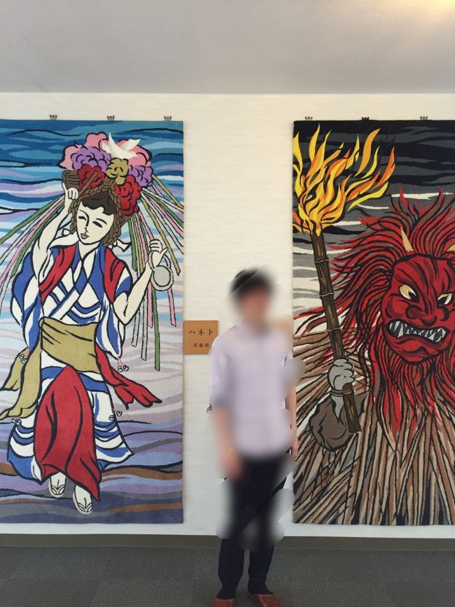 十和田湖は青森県と秋田県にまたがっています。これ、大きなカーペットなのですが、青森県＝ねぶた。秋田県＝なまはげです。