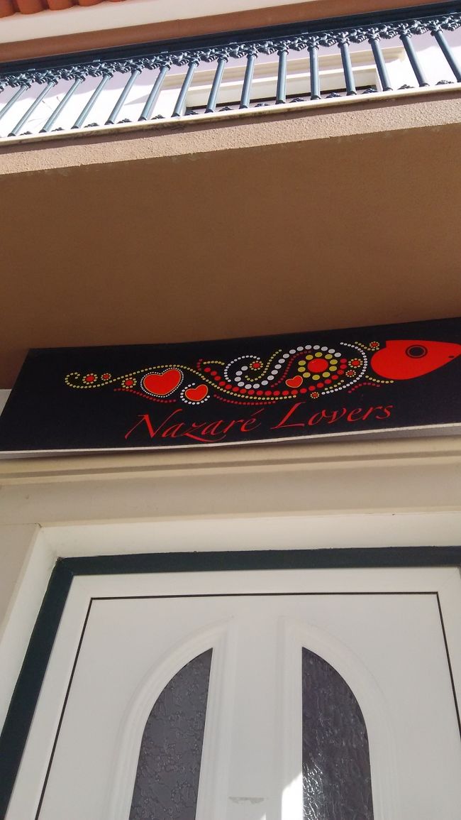 ドアの上にイワシ