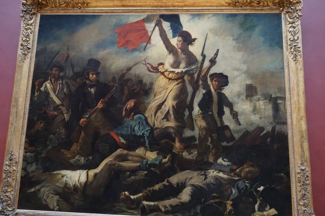 ドラクロワの民衆を導く自由の女神。<br />自由の女神の足元に倒れた人に注目。彼の服も、青・赤・白（ちょと見える白いシャツ）と国旗を意識してます。