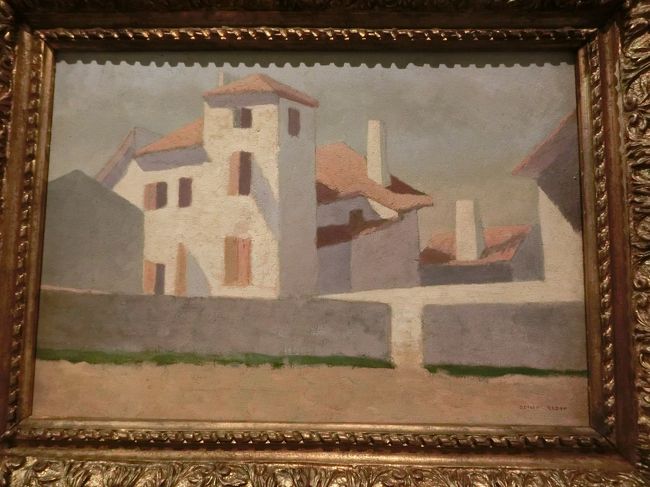 オディロン・ルドン：赤い屋根のある白い家の群れ。<br />