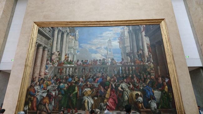 カナの婚礼<br />ルーブル美術館の中で、最も大きい作品。<br />イエス・キリストが水をぶどう酒に変えるといった最初の奇跡を行った聖書の一節がモチーフ