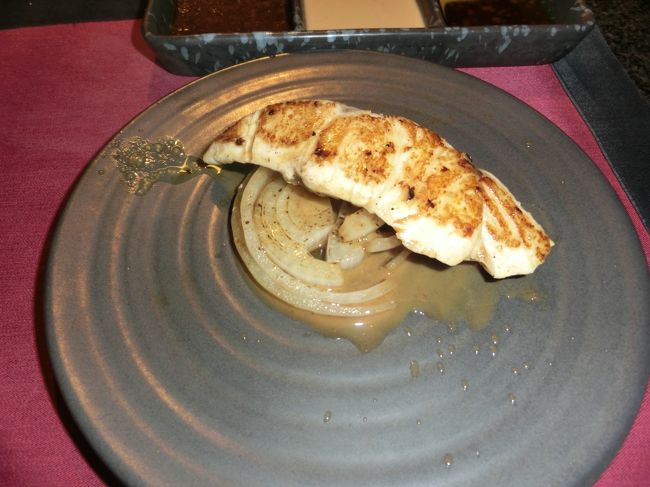 鯛と玉ねぎにポン酢バターが添えられています。