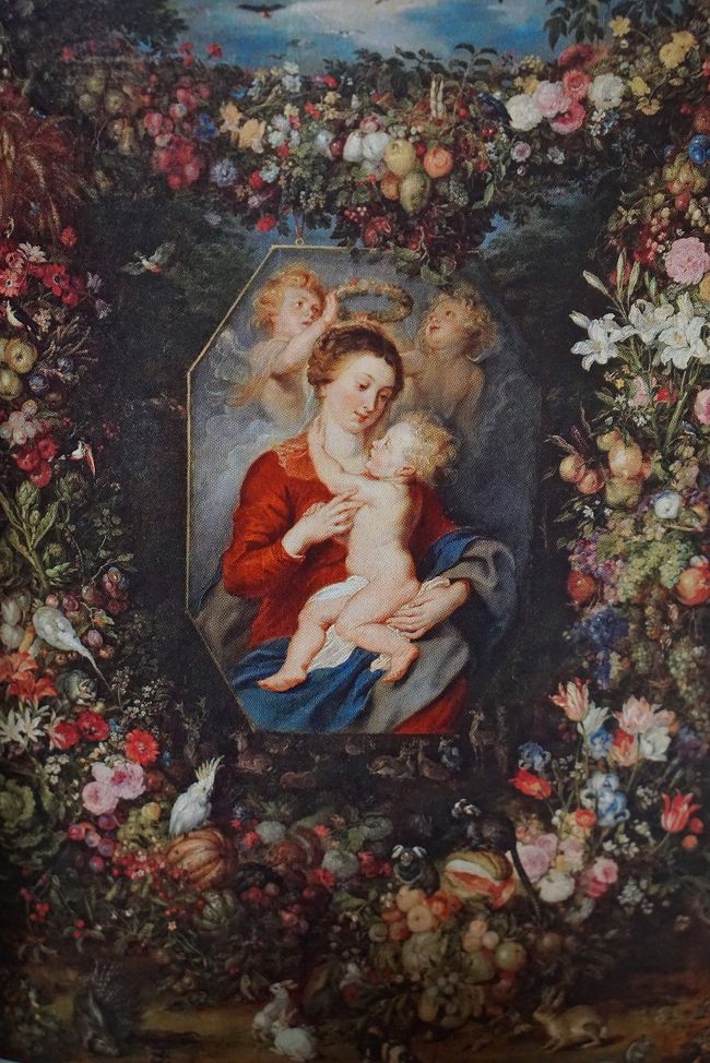 「花の聖母子」ヤン・ブリューゲル<br />パティニールの絵にマセイスが人物を描いたように、ヤン・ブリューゲルの描いた花々の中にルーベンスは聖母子像を描いています。このスタイルは17世紀にヤン・ブリューゲルが創始したスタイルで当時の知識人階級から支持されたそうです。