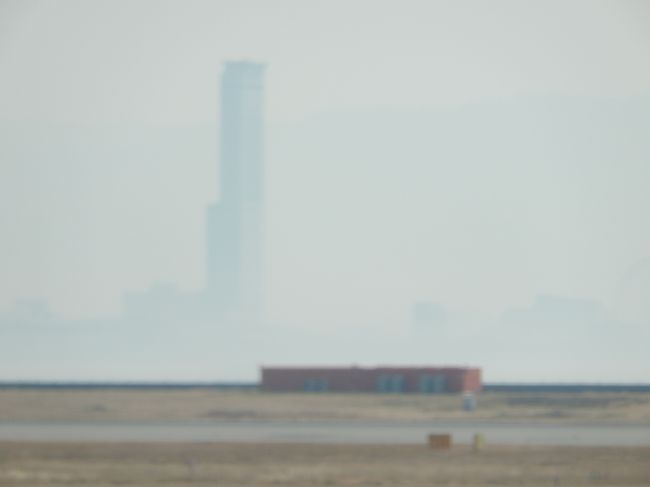 <br />　タキシング中。<br /><br />　ゲートタワービルが霞んでます。お天気はいいのに。