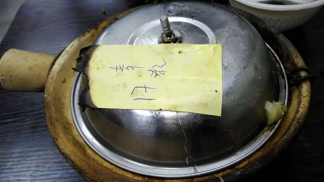 タコの?仔飯<br />タレを回し入れてしばらく蒸らす