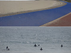 　防波堤に囲まれた砂浜。その向こうでは、海水浴客が海と戯れている。

　ん？海水浴客でなくてサーファー？サーフィンって、波に乗るものだと思ってたけど、防波堤の内側でも出来るものなのか？