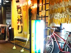 「立呑み食堂 ねぎぼうず」

「熊本市　老舗居酒屋」で検索したら出てきました
立ち呑みの他に座って飲めるテーブル席もあり

