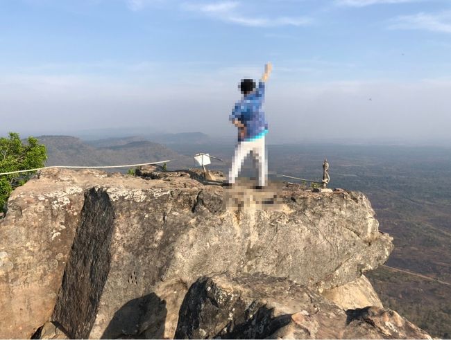 ガイドさんが一人一人写真を撮影してくれます。<br />