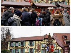 泉のある広場に来ました。
通りに幅がないため、リボーヴィレの屋台は、こういったちょっとしたスペースに出ています。
泉の向こうに見えている黄色い木組みの家は、”ホテル・デュ・ムトン”。