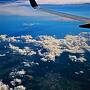 JAL261便　機上～　空-雲-地表の光景　☆三河湾-関西空港-大阪湾-淡路島？辺りを通過し