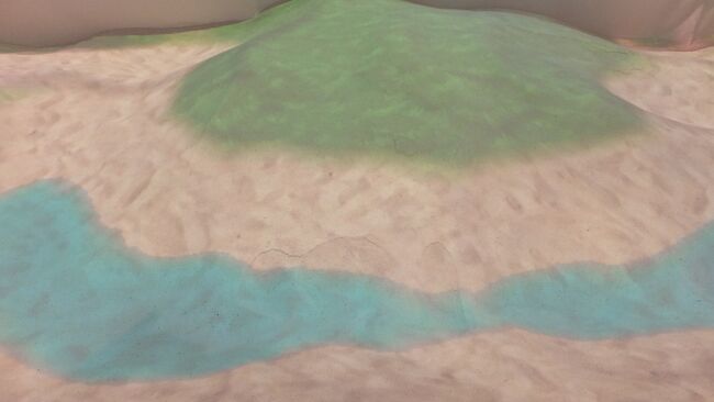 砂で山を作ると草木が生え、溝を作ると川ができるのです。